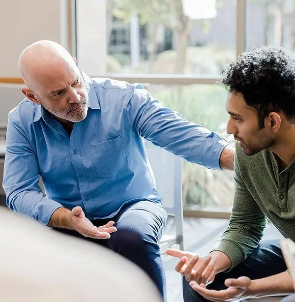 Two men in conversation